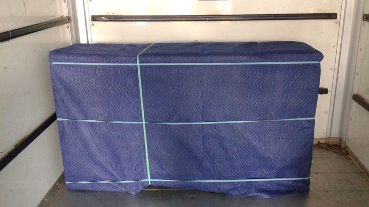 Dresser wrapped in moving blankets (Full Service Moving) by Moving Pros CLE