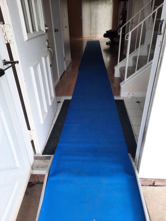 Floor runner protecting an entryway (Full Service Moving) by Moving Pros CLE