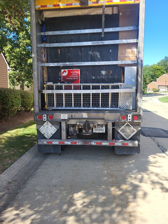 Rear of a box truck opened for loading (Labor only moving) by Moving Pros CLE