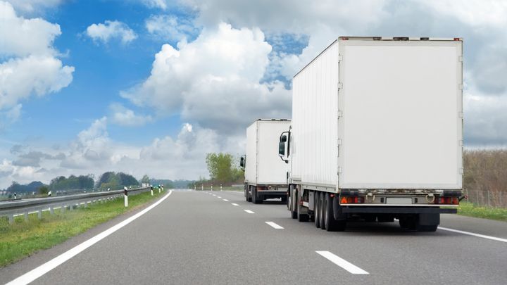 Moving truck on the highway (Long Distance Moving Services) by Moving Pros CLE